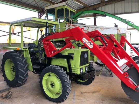 Tracteur Hürlimann H355 avec arceau – Chargeur frontal en option (1986)